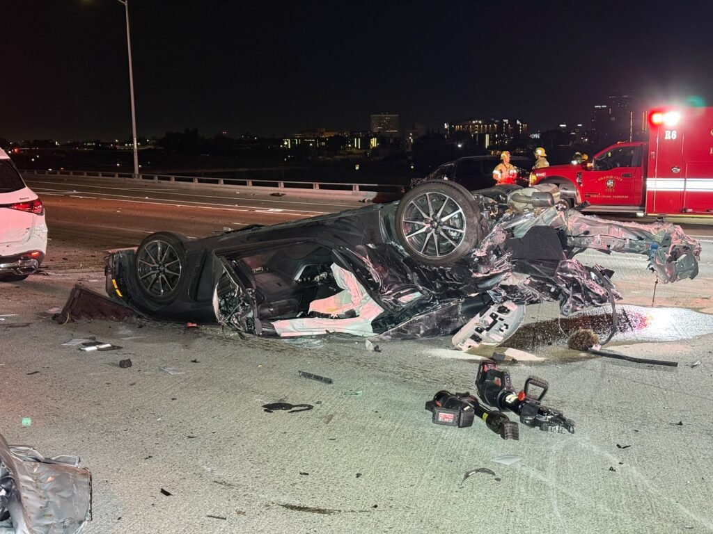 Overturned vehicle with heavy damage on southbound 57 Freeway