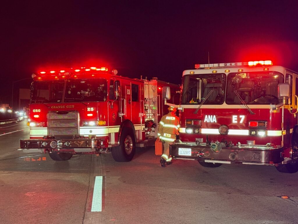 Fire engines parked across freeway during major nighttime accident